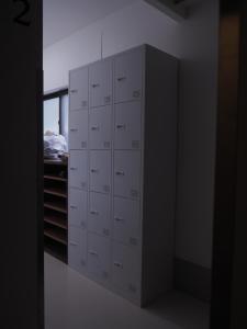 a room with a closet with white cabinets at Asagaya Iriguchi in Tokyo