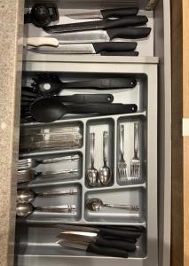 a drawer filled with silver utensils in a drawer at Beach Loft Style and Beach Heated Pool in Mazatlán