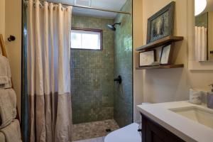 a bathroom with a shower and a sink at Wanderwood in Guerneville +37 photos
