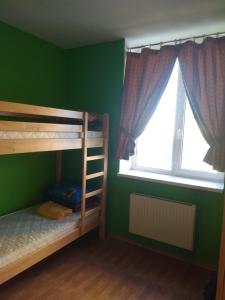 Postel nebo postele na pokoji v ubytování Yourhostel Saperka