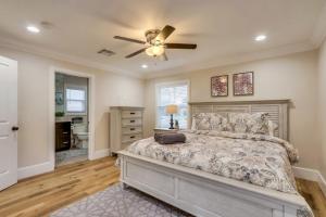 a bedroom with a bed and a ceiling fan at Gorgeous Upgraded 5 Bedroom & 4 Bath Home with Jacuzzi in Orange +20 photos