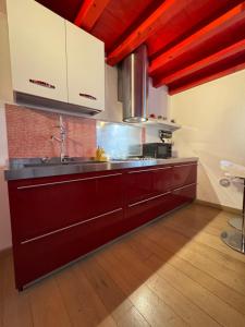 a kitchen with a sink and a counter at al home in Crema