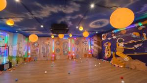 a room with a rock wall and a bowling alley at GREENHILLS RESORT Si Racha in Ban Nong Wa +54 photos