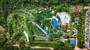 an overhead view of a water park with a pool at GREENHILLS RESORT Si Racha in Ban Nong Wa