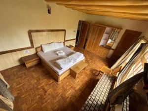 an overhead view of a bedroom with a bed at Gangs-Shun Homestay in Leh +2 photos