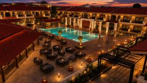 an overhead view of a courtyard with a swimming pool at Mangalam Resort & Spa - Member of Absolute Collection in Aurangabad