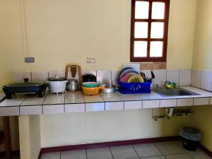 Kuchyň nebo kuchyňský kout v ubytování Hotel Moctezuma