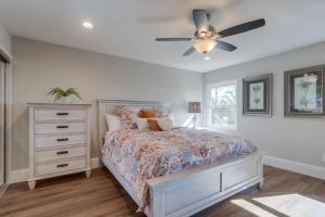 a bedroom with a bed and a ceiling fan at Gorgeous Upgraded 5 Bedroom & 3 Bath Home with pool in Orange +35 photos