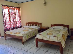Letto o letti in una camera di Hotel Moctezuma