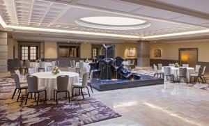 a banquet hall with tables and chairs and a fountain at Hyatt Centric Fisherman's Wharf San Francisco in San Francisco +47 photos