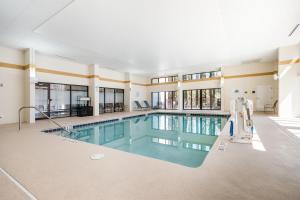a large swimming pool in a large building at Hampton Inn Harbourgate in Myrtle Beach