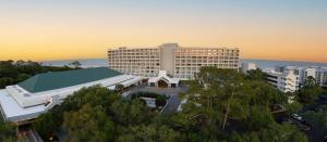 a large building with a church in front of it at Hilton Beachfront Resort & Spa Hilton Head Island in Hilton Head Island