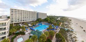 an aerial view of a hotel and the beach at Hilton Beachfront Resort & Spa Hilton Head Island in Hilton Head Island