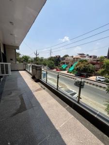 a view of a city street and a bridge at ADA Residency in Noida +10 photos