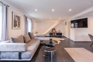 a living room with a couch and a table at Lara Prime in Zepkow