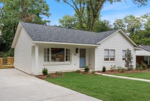 a white house with a gray roof at Family Friendly 4BR Oxford Home Near The Square in Oxford