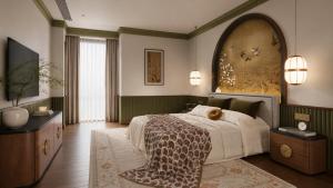 a bedroom with a bed and a large painting on the wall at Pristine Living at Tokyo Riverside PIK2 in Muara