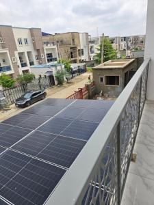 a solar array on the roof of a building at House 27 Cool vibes in Idu