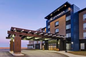 a rendering of the entrance to a hotel at Canalta Kindersley in Kindersley