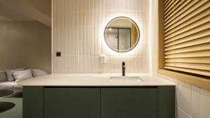 a bathroom with a sink and a mirror at Anook Hotel Ulsan Mugeo in Ulsan +221 photos