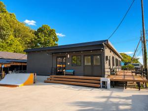 a small house with a ramp and a skateboard at 江田島BASE in Okimi in Etajima