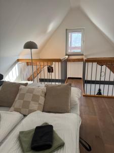 a living room with a couch and a window at Alte Schmiede in Sundern