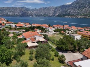 an aerial view of a town with a body of water at Villa Four-bedroom Prcan Kotor in Prčanj