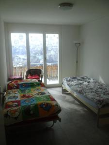 Katil atau katil-katil dalam bilik di Ferienwohnung Suter