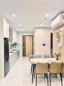 a kitchen and dining room with a table and chairs at Bristol Court in Kathmandu