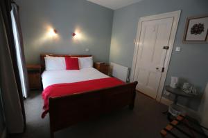 Postel nebo postele na pokoji v ubytování Rolling Wave Guesthouse