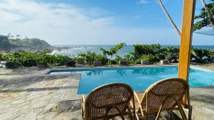 a view of the ocean from the pool at Blue Beach Villa - Nilwella in Matara