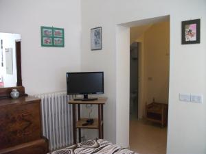 TV a/nebo společenská místnost v ubytování B&B La Principessa