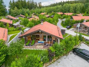an aerial view of a house with an orange roof at Ferienhütte 15 in Sankt Englmar
