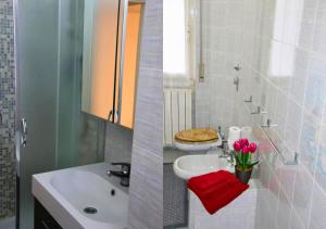 two pictures of a bathroom with a sink and a toilet at Casa Calipso in Melzo