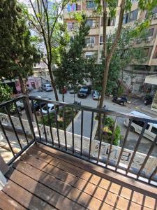 a balcony with a view of a city street at HOTEL CENTERPOINT Tirana in Tirana