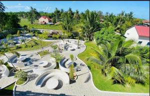 an aerial view of a resort with trees and plants at Khemra Boutique in Kampot in Kampot