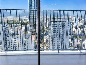 a view of a city from a tall building at HD Panorma Nha Trang Free Pool & Gym Condotel in Nha Trang