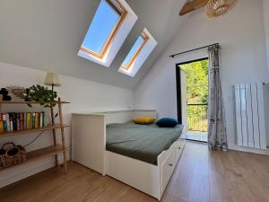 a bedroom with a bed and a window in a room at Sea View Private Villa in Batumi