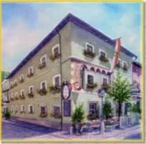 a painting of a large building with at Hotel Gasthof Brüggler in Radstadt