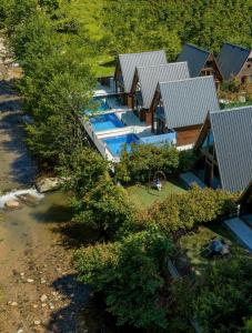 an aerial view of a house with a swimming pool at Oce Bungalow in Ardeşen