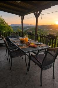 a table with food on it on a patio at Relax House Lara in Krapinske Toplice in Krapinske Toplice +31 photos