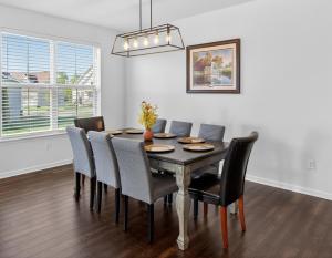 a dining room with a table and chairs at Spacious Family Gathering Space Privacy Zones Quiet, Convenient Neighborhood in Middletown