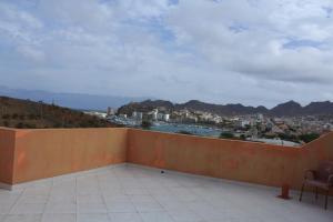 a balcony with a view of a city at Residencial Beleza in Mindelo