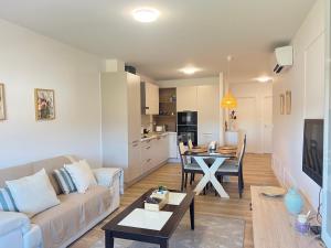 a living room with a couch and a table at Ribeira Sacra Ledicia in Chantada