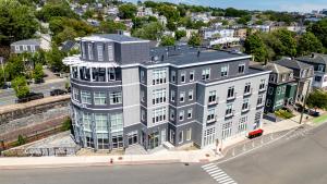 an overhead view of a large building on a city street at Beacon Suites Hotel in Somerville