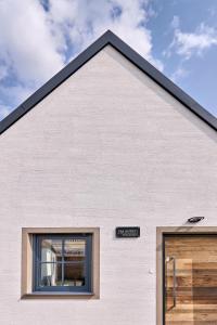 a building with a window on the side of it at Wiegehaus Retz in Retz +3 photos