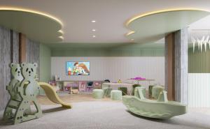 a childrens room with a play area with a play implement at Beach GAV Resorts in Salinópolis