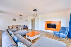 a living room with a couch and a table at The Townhouse Apartment in Kaş