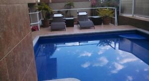 Swimming pool sa o malapit sa Hotel Real Santa María