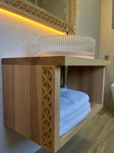 a bathroom with a wooden vanity with a mirror at Gościniec u Bobaków in Ząb +88 photos